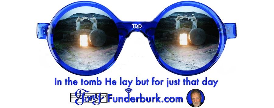 In the tomb He lay but for just that day